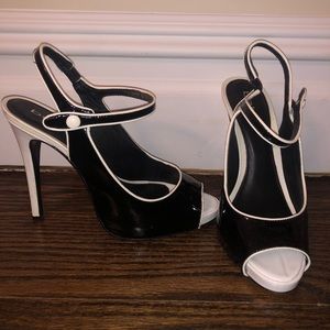 Bebe Black and white leather heel